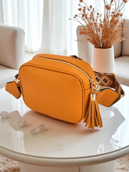 Royalfashion Mala ženska torbica iz eko usnja s pisanim pasom Kovi Lace