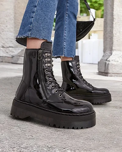 Dámske členkové topánky Fezolio od značky Royalfashion. Členkové topánky pre ženy workery sú výnimočná obuv, ktorá kombinuje štýl a pohodlie. Vyrobené z laku ekokože a vyplnené mäkkým kožušinou. Model so šnurovaním a zipsom. 87654321 <p>ŽENSKÉ TOPÁNKY ČLE