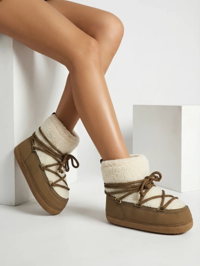 Ženski škornji za sneg s kožuhom Uvella