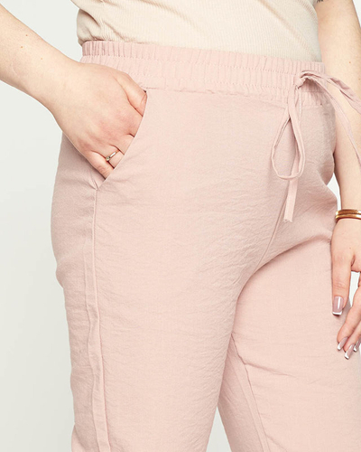 Dámske ružové látkové joggery PLUS SIZE - Oblečenie