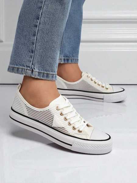 Royalfashion Dámske perforované tenisky Rebbse