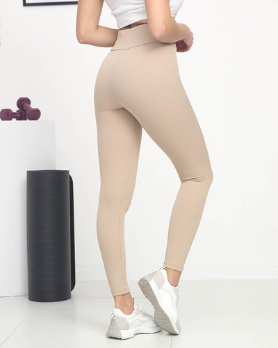 Dámske svetlohnedé rebrované legíny s oranžovými nápismi - Clothing