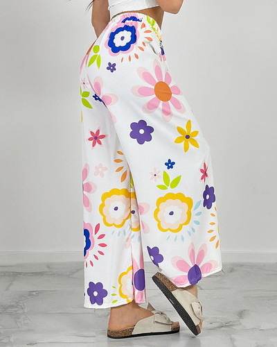 Royalfashion Dámske široké nohavice z kvetinovej látky