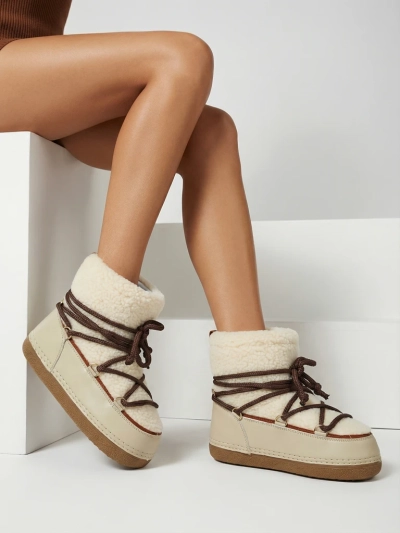 Ženski škornji za sneg s kožuhom Uvella