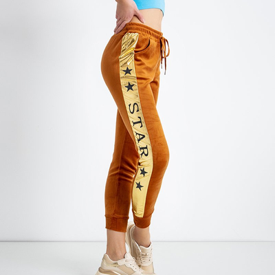 Dámske hnedé tepláky so zlatými pruhmi - Oblečenie