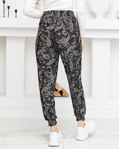 Dámske čiernobiele látkové nohavice s potlačou - Oblečenie