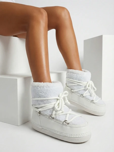 Ženski škornji za sneg s kožuhom Uvella