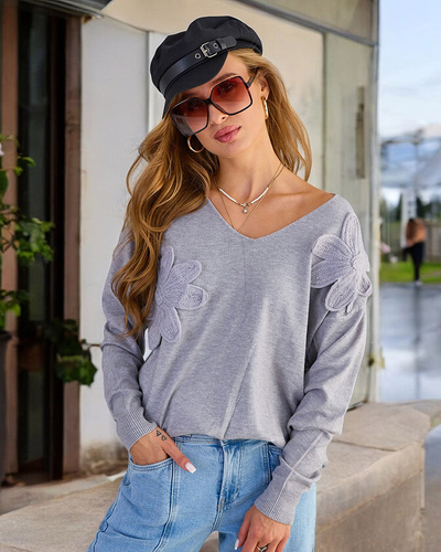 Royalfashion Tenký dámsky sveter s kvetmi