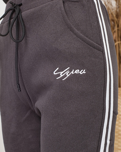 Dámske zateplené tepláky v sivej farbe- Oblečenie