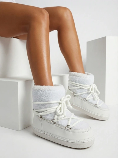 Ženski škornji za sneg s kožuhom Uvella