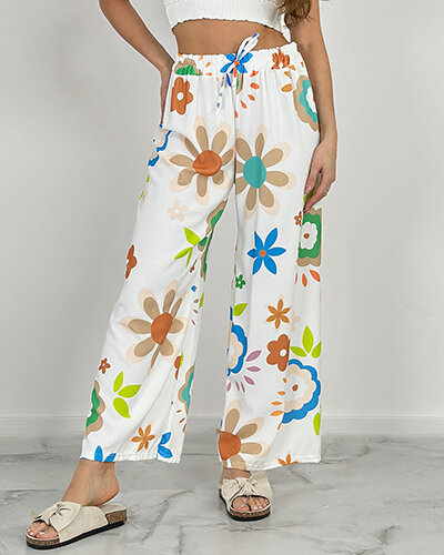 Royalfashion Dámske široké nohavice z kvetinovej látky
