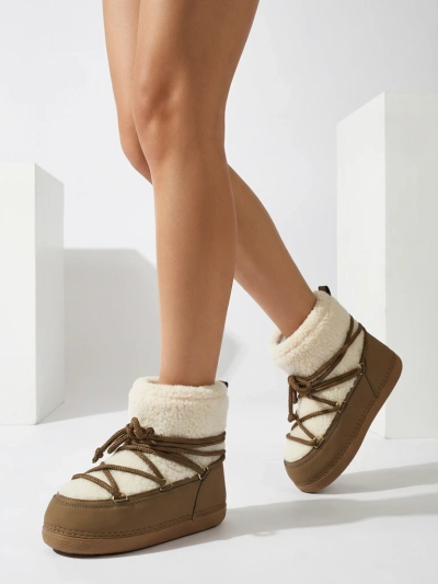 Ženski škornji za sneg s kožuhom Uvella