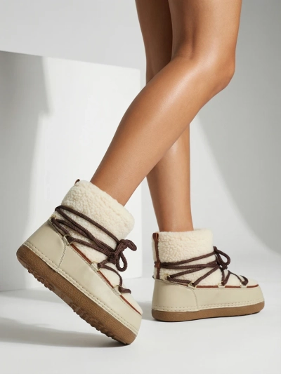 Ženski škornji za sneg s kožuhom Uvella