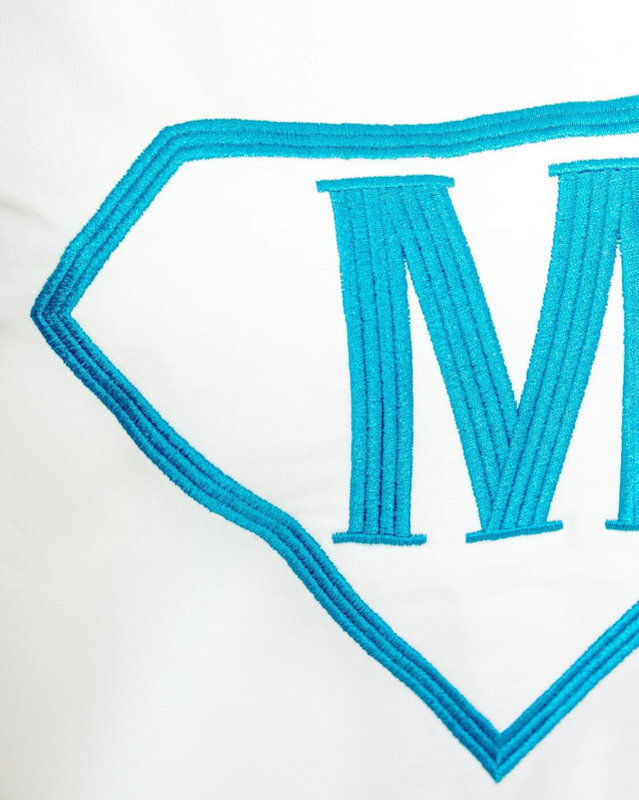 Dámska bielo-modrá športová tepláková súprava s odznakom - Oblečenie