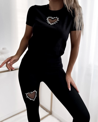 Royalfashion Čierna dámska športová súprava so srdiečkami