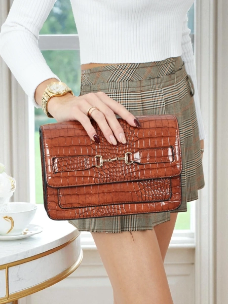 Lakirana majhna ženska torbica iz eko usnja Lunisse