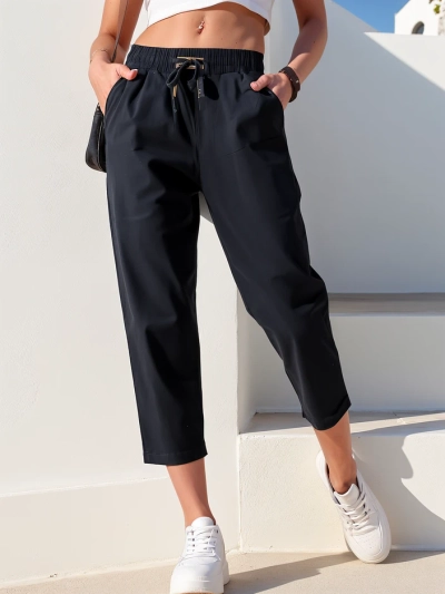 Royalfashion Jednoduché dámske látkové nohavice 7/8