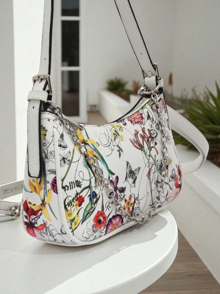 Royalfashion Malá dámska kabelka z eko kože s kvetmi Lily Bloom