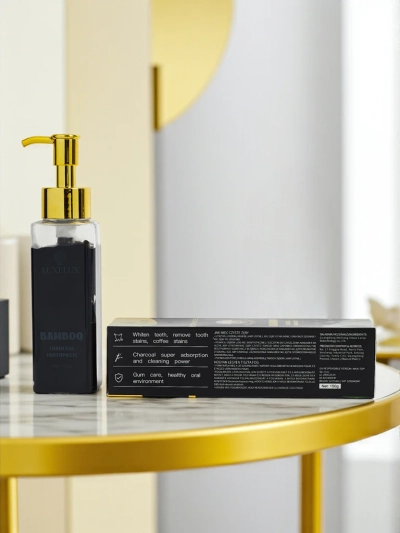 LUXELUX Zobna pasta za beljenje s tavrinom in aktivnim ogljem