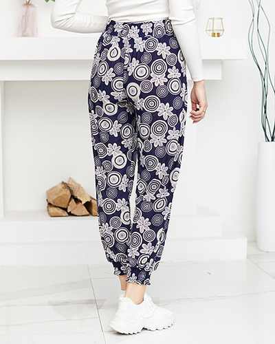 Námornícko-biele dámske nohavice s potlačou PLUS SIZE - Oblečenie