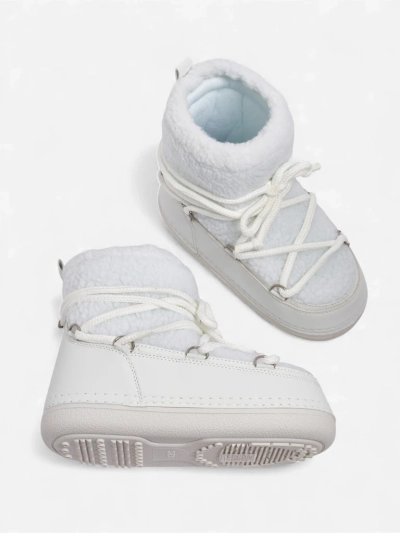 Ženski škornji za sneg s kožuhom Uvella