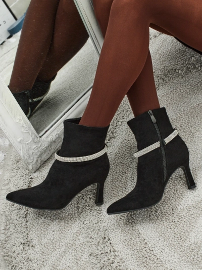 Ženski škornji s peto Sorelia