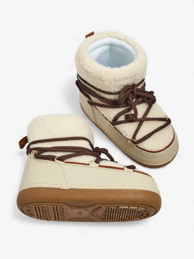 Ženski škornji za sneg s kožuhom Uvella