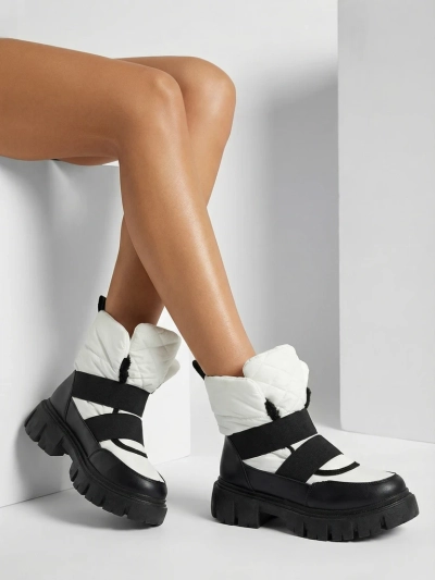 Dámske snehové topánky na plochej podrážke v čierno-bielej farbe Ferory- Obuv