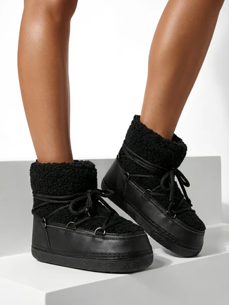 Ženski škornji za sneg s kožuhom Uvella