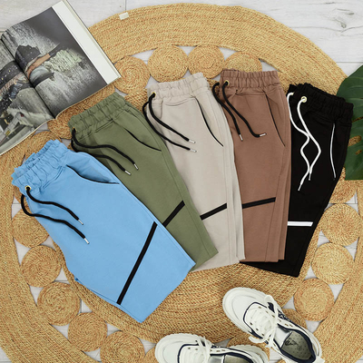 Dámske svetlošedé tepláky - Oblečenie