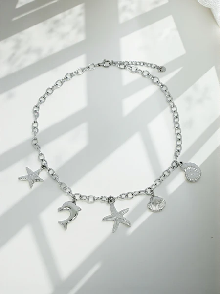 Naszytnik Atena Charm Sea – zlati amuleti z morskimi motivi