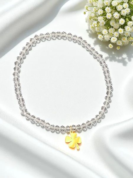 Royalfashion Dámsky náramok s príveskom štvorlístka