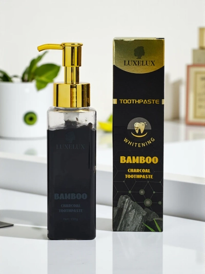 LUXELUX Zobna pasta za beljenje s tavrinom in aktivnim ogljem