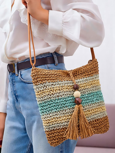 Royalfashion Malá slamená dámska kabelka s prúžkami a ozdobným príveskom Mini