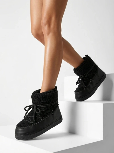 Ženski škornji za sneg s kožuhom Uvella