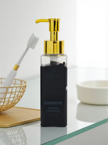 LUXELUX Zobna pasta za beljenje s tavrinom in aktivnim ogljem