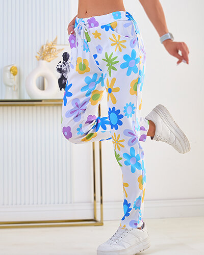 Royalfashion Dámske nohavice z kvetinovej látky