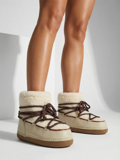 Ženski škornji za sneg s kožuhom Uvella