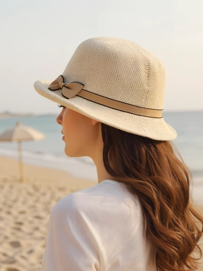 Royalfashion Dámsky klobúk zdobený mašľou Summer Grace