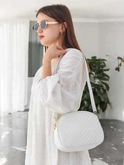 Royalfashion Oválna malá kabelka pre ženy vyrobená z eko-kože