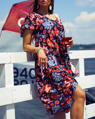 Royalfashion Námornícky modré dámske šaty s farebným kvetinovým vzorom