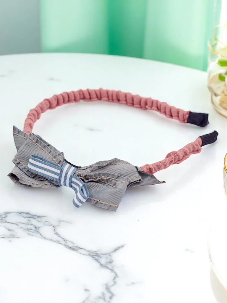 Royalfashion Detská čelenka s mašľou Sweet Bow