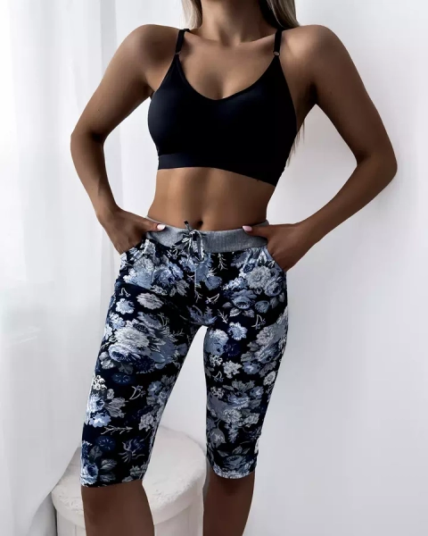 Modré dámske 3/4 šortky s kvetinovým vzorom - Oblečenie