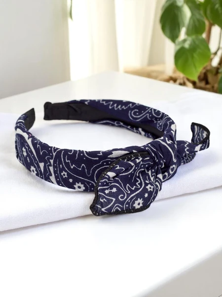 Royalfashion Vzorovaná čelenka do vlasov s mašľou Mila