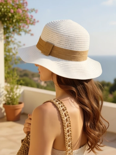 Royalfashion Dámsky slamený klobúk s mašľou Whisper