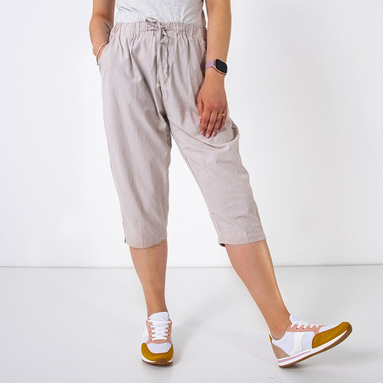 Dámske béžové šortky 3/4 dĺžky s vreckami - Oblečenie