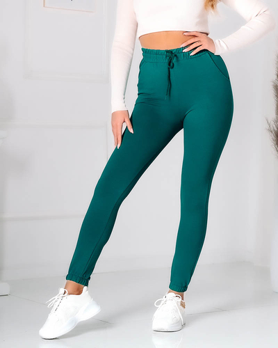 Klasické dámske tmavozelené tepláky - Oblečenie