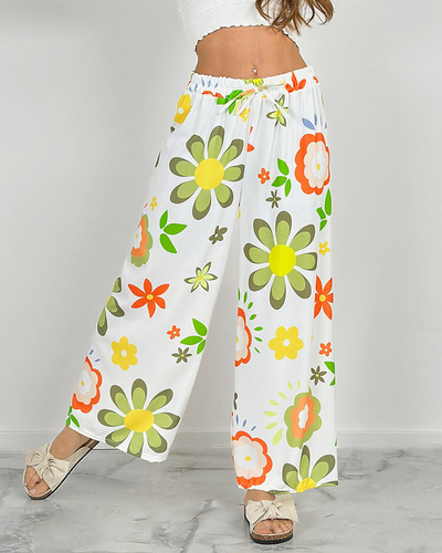 Royalfashion Dámske široké nohavice z kvetinovej látky
