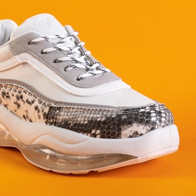 OUTLET Biele dámske športové topánky s vložkou z hadej kože Vina - Obuv