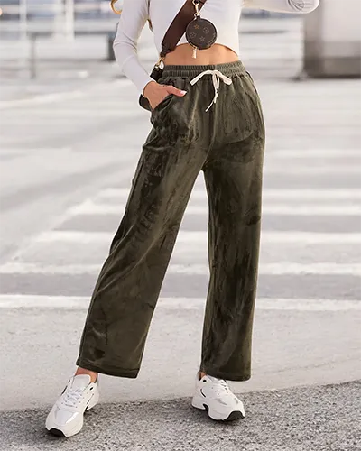 Royalfashion Dámske tepláky a'la velúr